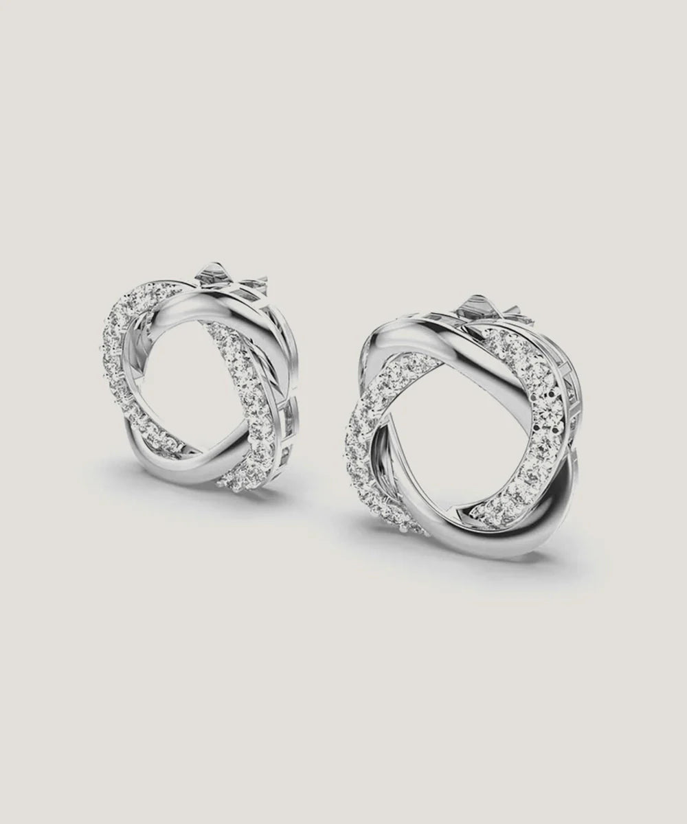 Women's Stud Earrings in a sleek high-contrast midnight luxury editorial style